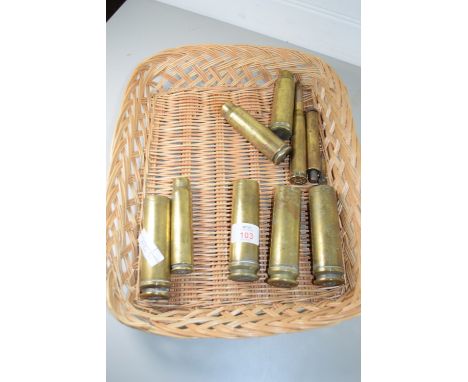 SMALL WICKER BOX CONTAINING BRASS CARTRIDGE CASES AND A LIGHTER MADE BY A GERMAN PRISONER OF WAR