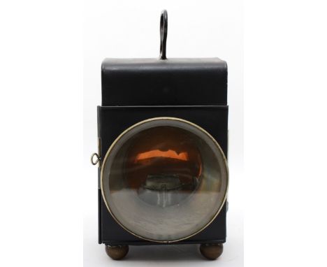 A vintage paraffin lamp with clip to the back, restored, stamped 104 to base 