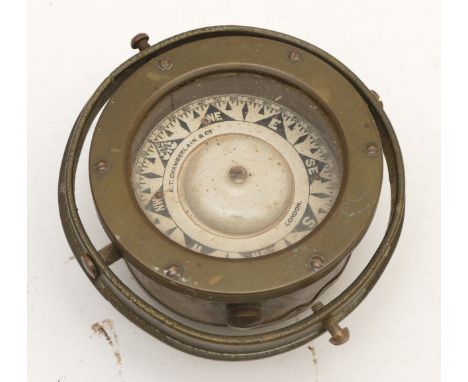 A.T. Chamberlain &amp; Co. a brass 4" ships gimballed compass. 