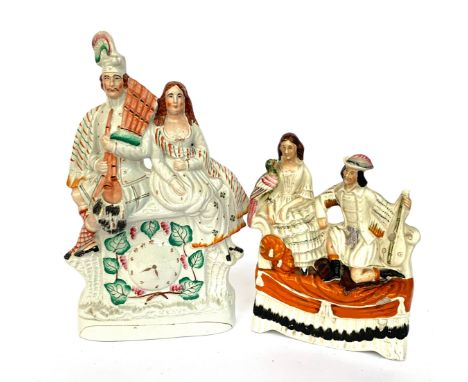 A Staffordshire flat back figure of a Scottish man and lady, 37cmH; together with a couple on sofa with bird and lute, and on