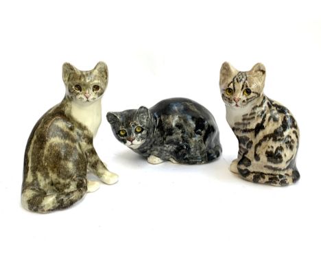 Three Winstanley pottery cats, sizes 4, 5, and the largest, a sitting size 5, 27cmW; all signed, numbered, with 'England' to 