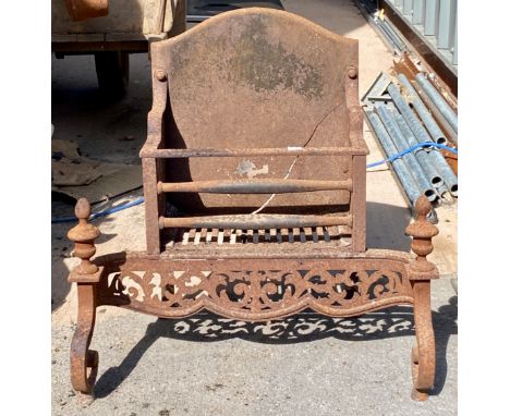 A cast iron and steel fire back and grate, cracked, approx 61cmH (backplate cracked)