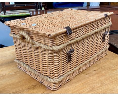 A wicker hamper with rope reinforcement and carry handles, 70cmH