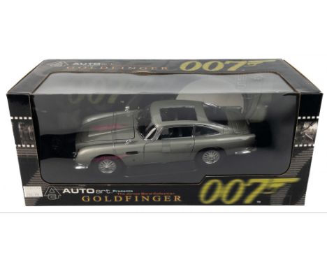 AUTOart presents the James Bond Collection 007 JAMES BOND GOLDFINGER to include a detailed scale model 1:18 die-cast ASTON MA