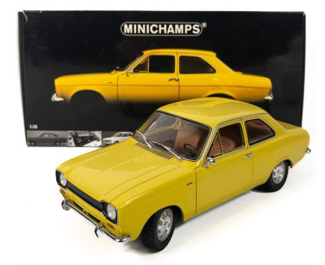 MINICHAMPS FORD ESCORT 1 STREET - 1971 1:18 scale model in a new condition in original packing and box the car comes in a cla