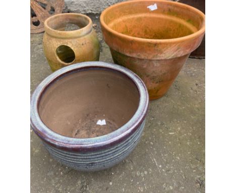 Three garden planters to include a large terracotta pot dimensions 30cm height x 37cm diameter and also a small terracotta st