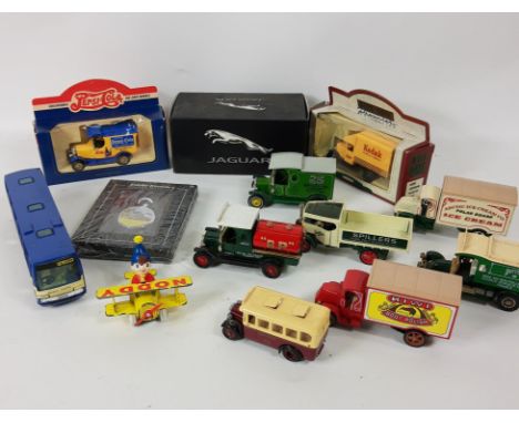 A collection of vintage model cars to include a Lledo Edinburgh corporation bus, a play-worn NODDY in his bi-plane, a boxed J