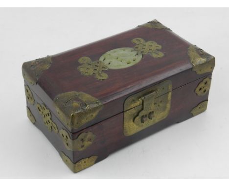 A Chinese jade and brass inlaid hardwood jewellery box. H.6.5cm W.18cm D.10cm