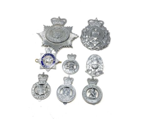 8 vintage police helmet plates -badges 