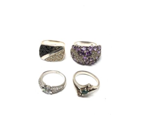 4 silver gemstone set rings weight 33g 