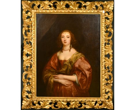 Follower of Anthony Van Dyck, a portrait of a lady, oil on canvas, 44.5" x 33.5", in a fine carved Florentine style frame.