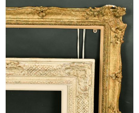 A 19th Century gilt composition frame with a light finish, rebate size 15" x 21.75" (38 x55cm) along with later swept frame, 