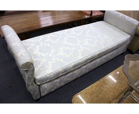 A 19th century day bed with classical print upholstery
