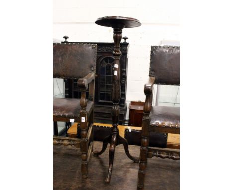 A mahogany tripod jardiniere stand