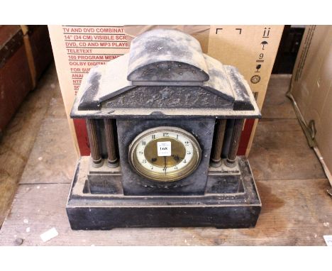 An old slate mantel clock