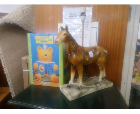 A pottery horse lamp and a novelty cookie jar