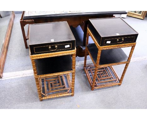 A good pair of Chinese black lacquer and bamboo two tier single drawer lamp tables
