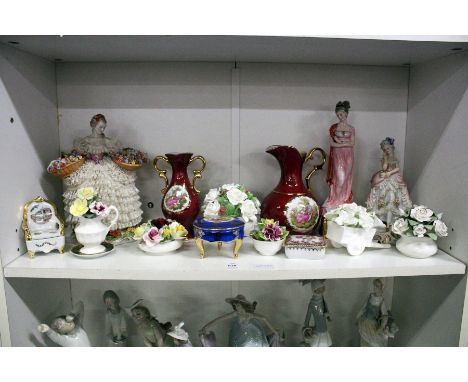 A shelf of decorative china