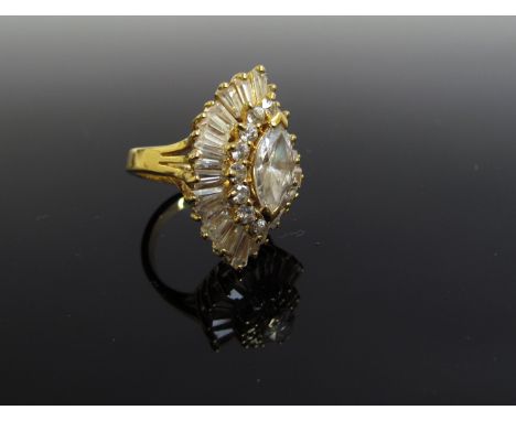 A Napier yellow metal dress ring set with clusters of white stones reputedly bought from Harrods, size N