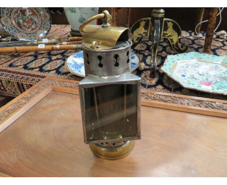A tin Davy lamp by "I. Mills" (Newcastle) with trapezoid window 