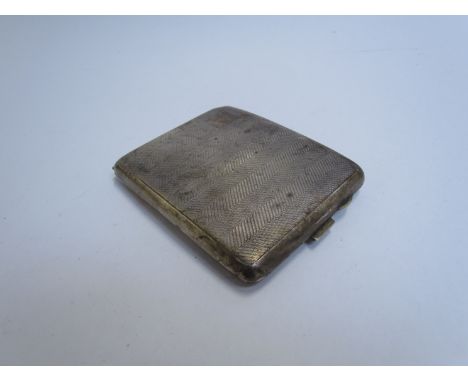 A silver cigarette case, engine turned curved outer, Birmingham 1930, 112g