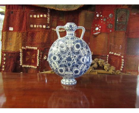 A Chinese Islamic influence blue and white moon flask 