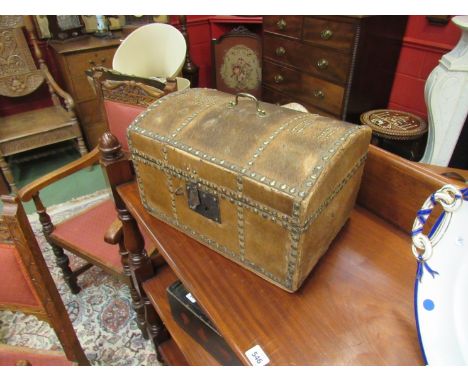 An 18th Century small domed trunk, lable inside for "Bailey Saddles, Preston", pony skin covering with brass stud work, 24cm 