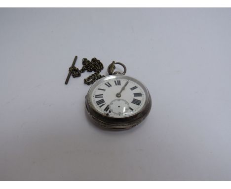 A Birmingham silver pocket watch, white enamel dial with Roman numerated chapter ring 