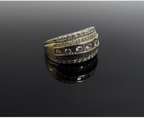 A white gold multi row diamond set ring stamped 18kt 1.00, size O, 6g   