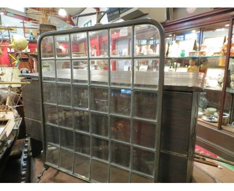 A 19th Century brass framed firescreen with leaded glazed screen of 36 bevelled glass panels  