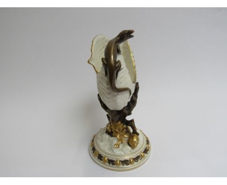 A Royal Worcester table centre piece with lizard and shells, 22cm tall 