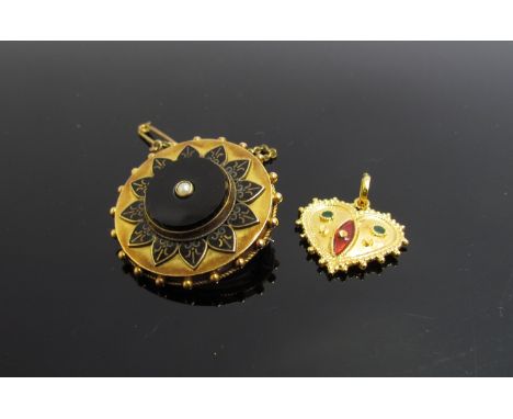 A Victorian mourning brooch with panel back and a heart shaped pendant with enamel decoration stamped 916 