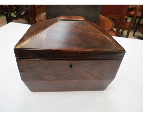 A mahogany tea caddy with lion mask handles