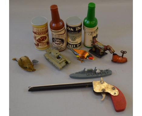 Good mixed lot including a Chad Valley Bandit Repeater, tin plate/metal toys and dancing dolls with Charlie Chaplin interest.