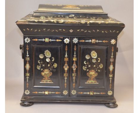 Early-mid 19th Century ladies ebony table top writing/sewing cabinet inlaid with mother-of-pearl detailing, the lift-up top o