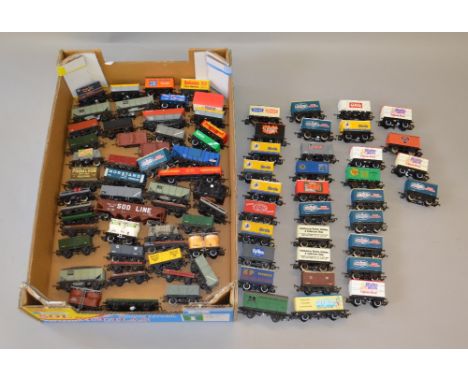 OO Gauge. Unboxed wagons, hopper wagons & box vans. 80+ Hornby, Wrenn, etc. Overall F/G Few missing coupling hooks.