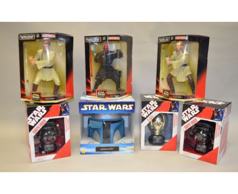 Seven Star Wars items: three Applause Mega Collectibles; three Hasbro Scaled Replica Helmets; Rubies Jango Fett Helmet. Boxed