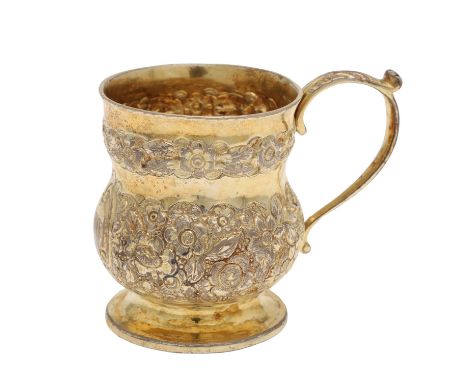 of campana form, with a scroll handle and the body chased &amp; embossed with foliage, initialled, by Edward Power, Dublin 18