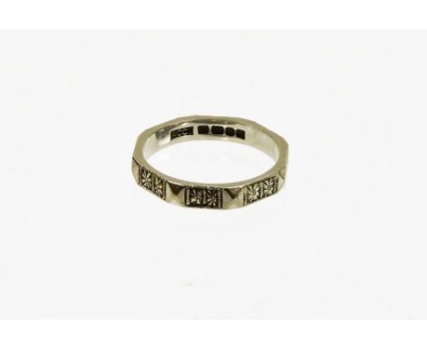 An 18ct white gold wedding band, with hammered cross and diamond design, maker ACC, ring size K½, 3g all in.
