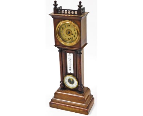 A late Victorian model of a longcase clock, with aneroid barometer, thermometer and timepiece movement with carved fretwork t