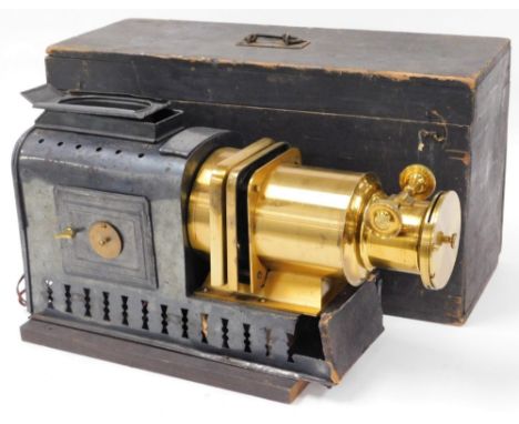 A Helioscopic magic lantern, bearing label for Walker Sylvers, 48 Waterloo Road SE, in an outer wooden case, the lantern 48cm