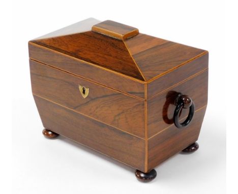 A 19thC rosewood tea caddy, with a domed top, opening to reveal two sections each with bone handle, and a brass shield escutc