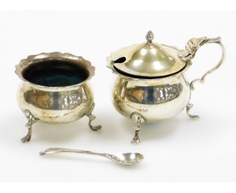 Two silver salts, to include an Oxford silver salt with flared rim on tripod shelf feet, Chester 1841, together with a silver