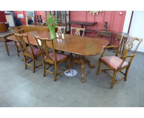 A George III style Ipswich oak pedestal dining table and six Chippendale style chairsPurchased in 2007 by the present vendor 