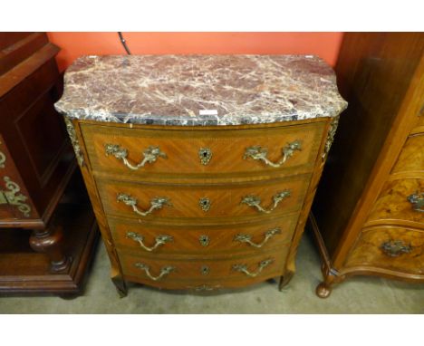 A French Louis XV style inlaid mahogany, gilt metal mounted and marble topped commode 