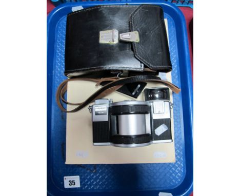 A Cased Horizon T Russian (USSR) 35mm Panoramic Camera, S/N 6907602 manufactured by KMZ, slight signs of wear noted; together