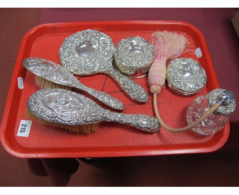 A Hallmarked Silver Backed Part Dressing Table Set, each allover detailed in relief, including trinket box and scent bottle:-