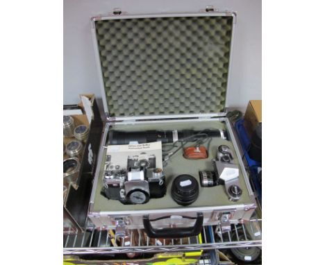 A Cased 35mm Camera Outfit, comprising a Praktica Super TL camera, with Edixa auto-focus 1:2.8 F=50 mm lens, a Wirgin Edixa-M