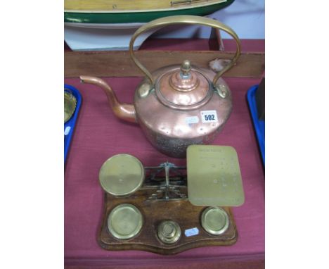 A Set of Brass Postal Balance Scales, with weights, on a mahogany serpentine plinth, and a victorian copper kettle, acorn fin