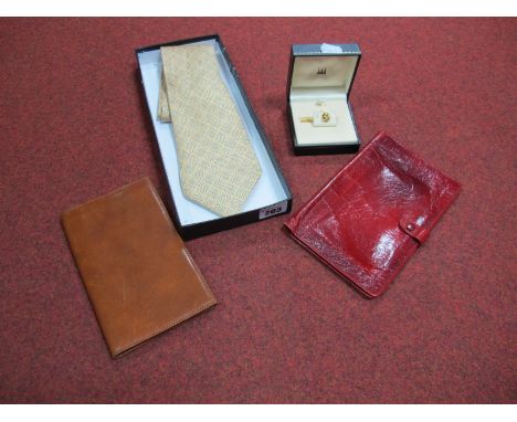 A Red Leather Dunhill Wallet, with press stud fastener, brown leather wallet marked "Highland Calf", beige and blue pattern H